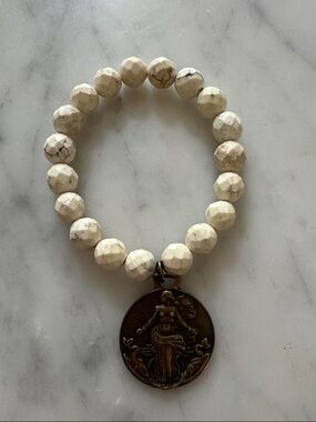 French Kande Cream Bead Bracelet with Antique Bronze Medallion